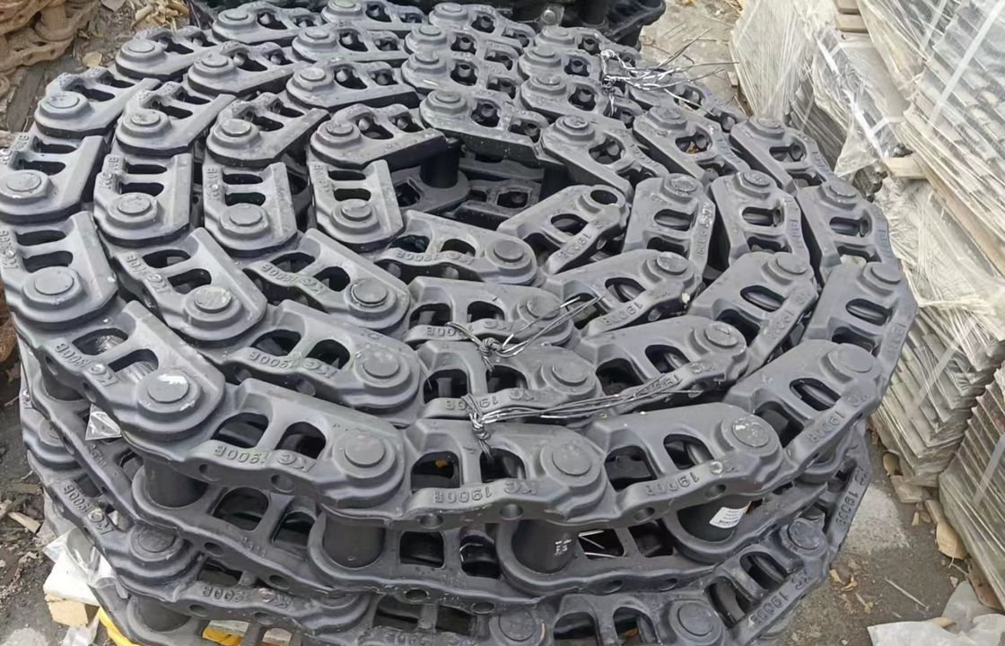 Sk200 এক্সক্যাভেটর পার্টস আন্ডার চ্যাসি পার্টস ট্র্যাক লিঙ্ক ট্র্যাক জুতা ট্র্যাক রোলার শীর্ষ নীচের রোলার স্প্রোকসেট আইডলার